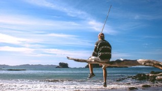 Man sitting at the beach